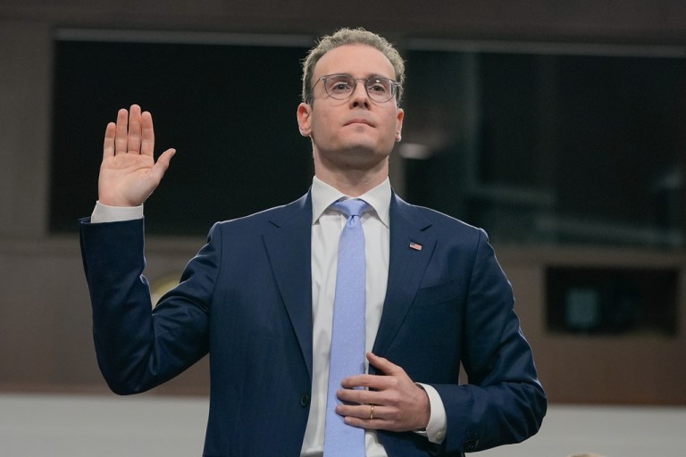 Michael Selig is sworn in during his confirmation hearing to the Senate Agriculture Committee, to become Chairman and Commissioner of the Commodity Futures Trading Commission on Capitol Hill, Wednesday, Nov. 19, 2025, in Washington. (AP Photo/Mariam Zuhaib)
