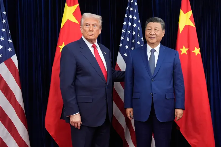 FILE - President Donald Trump, left, and Chinese President Xi Jinping pose ahead of their summit talk at Gimhae International Airport in Busan, South Korea, Oct. 30, 2025. (AP Photo/Mark Schiefelbein, File)