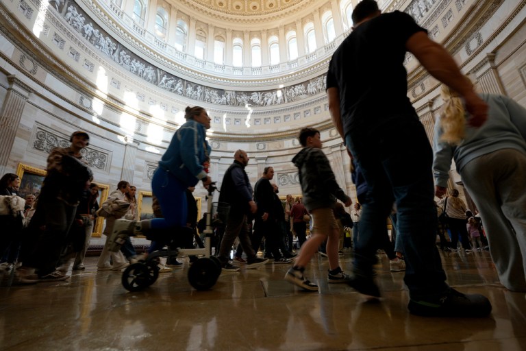 Tourists view the Rotunda during their tour of the U.S. Capitol Building in Washington.