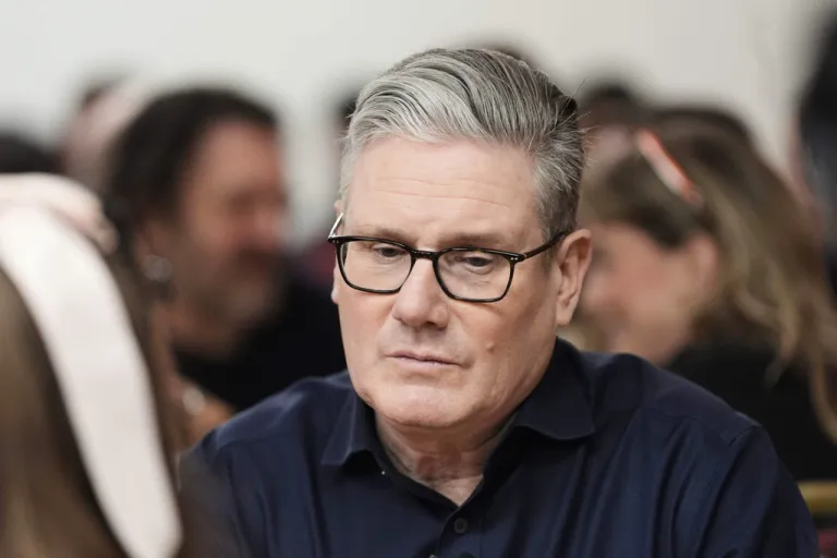 Britain's Prime Minister Keir Starmer meets local party members, in London, Friday, Feb. 27, 2026.