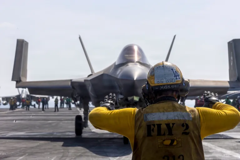 This image provided by U.S. Central Command shows a F-35C Lightning preparing to launch from the USS Abraham Lincoln (CVN 72) in support of Operation Epic Fury, on Saturday, Feb. 28, 2026.