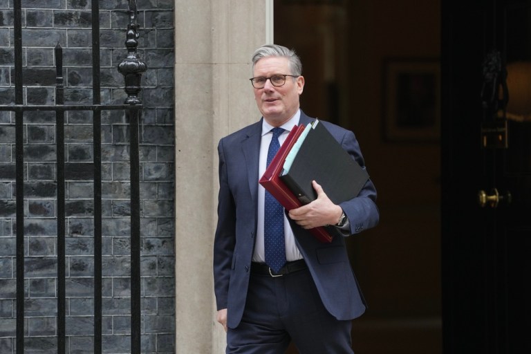 Britain's Prime Minister Keir Starmer leaves 10 Downing Street to attend the weekly Prime Ministers' Questions session in the parliament in London, England, Wednesday, March 4, 2026. (AP Photo/Kin Cheung)