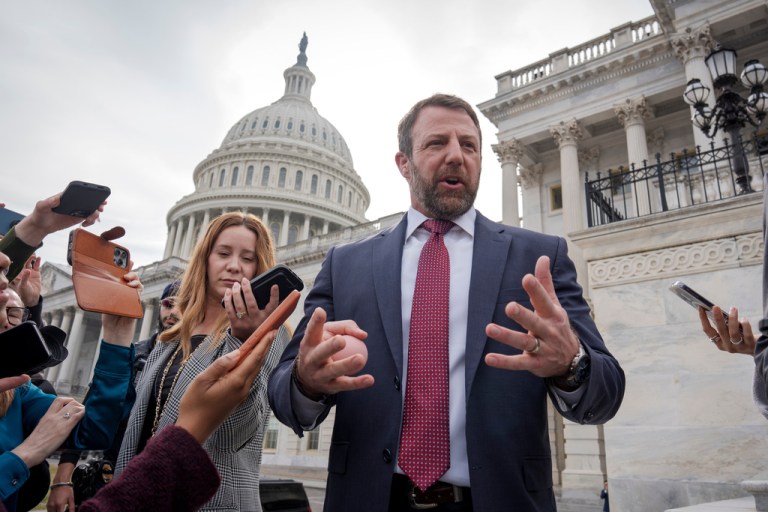 Sen. Markwayne Mullin, R-Okla., speaks with reporters on the steps at the Capitol in Washington, Thursday, March 5, 2026. (AP Photo/J. Scott Applewhite)