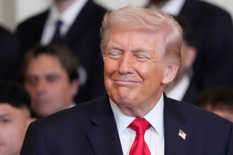 President Donald Trump smiles as he listens during an event to honor the 2025 Major League Soccer champions Inter Miami CF in the East Room of the White House, Thursday, March 5, 2026, in Washington.