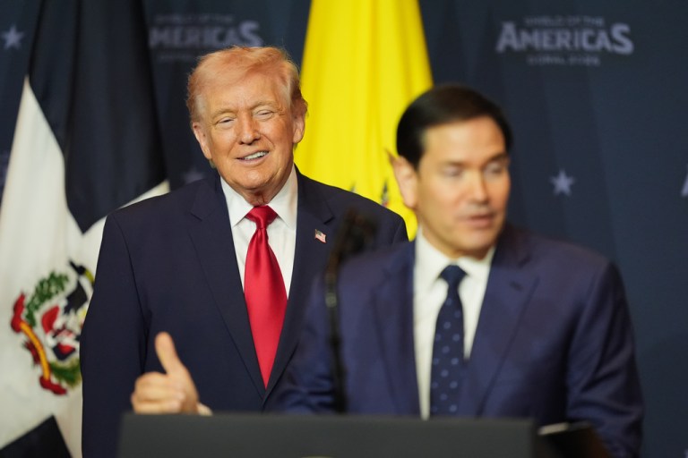 President Donald Trump listens while Secretary of State Marco Rubio speaks at the Shield of the Americas Summit, Saturday, March 7, 2026, at Trump National Doral Miami in Doral, Fla.