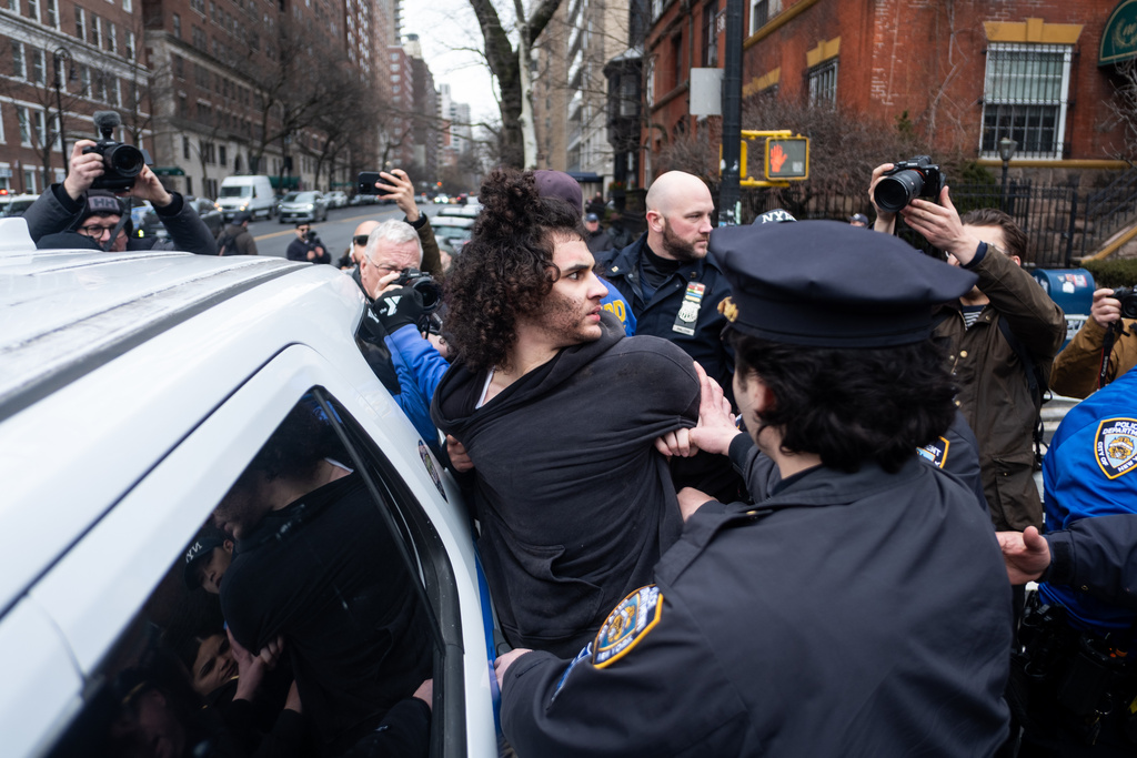 Police detain Emir Balat after he attempted to detonate an improvised explosive device during a counterprotest against far right influencer Jake Lang staging an anti-Islam protest outside Gracie Mansion