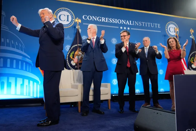 President Donald Trump dances as Rep. Tom Emmer, R-Minn., House Speaker Mike Johnson of La., Rep. Steve Scalise, R-La., and Rep. Lisa McClain, R-Mich., applaud at the Republican Members Issues Conference, Monday, March 9, 2026, at Trump National Doral Miami in Doral, Fla. (AP Photo/Mark Schiefelbein)