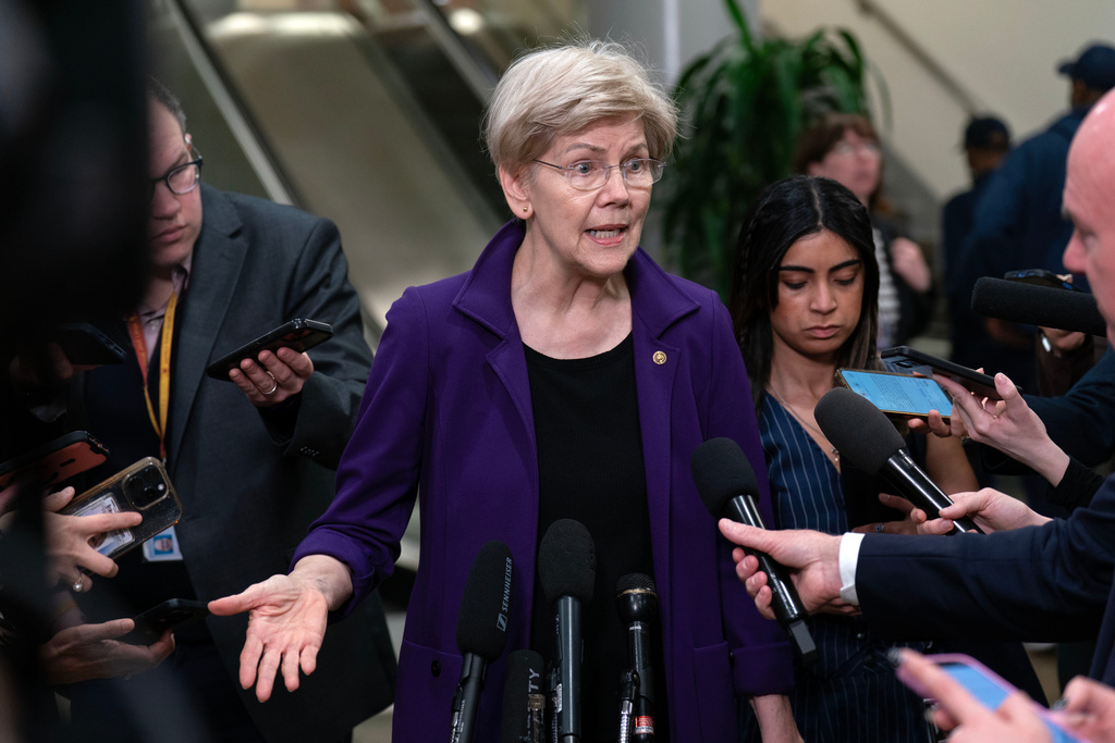 Warren backs populist primary candidates in Maine and Michigan