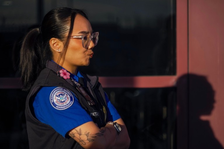 A TSA staff member waits to unload donated lunches from MGM Resorts during a partial government shutdown at the Harry Reid International Airport in Las Vegas, Wednesday, March 11, 2026. (AP Photo/Ty ONeil)