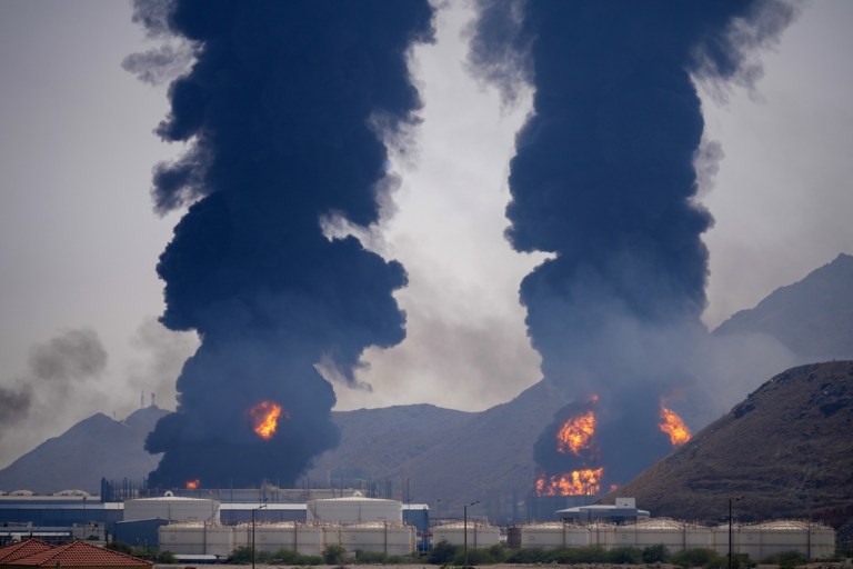 Plumes of smoke and fire rise after debris from an intercepted Iranian drone struck an oil facility, according to authorities, in Fujairah, United Arab Emirates.