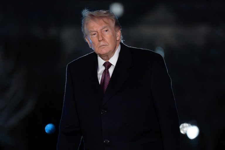 President Donald Trump walks on the South Lawn