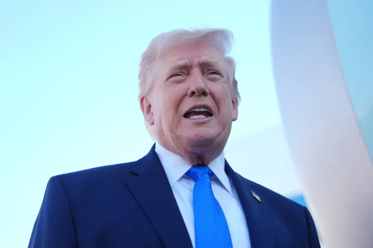 President Donald Trump speaks with the media before boarding Air Force One, Monday, March 23, 2026, at Palm Beach International Airport in West Palm Beach, Fla. (AP Photo/Mark Schiefelbein)