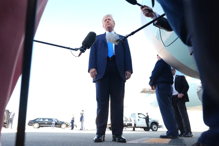 President Donald Trump speaks with the media.