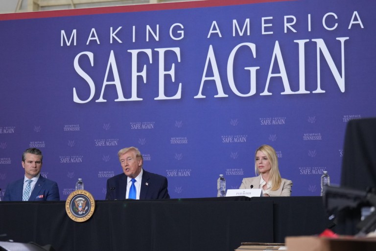 President Donald Trump participates in a roundtable discussion on public safety at a Tennessee Air National Guard Base, Monday, March 23, 2026, in Memphis, Tenn., with from left, Secretary of Defense Pete Hegseth, Trump and Attorney General Pam Bondi. (AP Photo/Mark Schiefelbein)