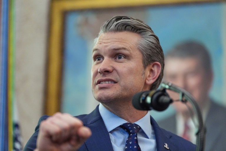 Defense Secretary Pete Hegseth speaks during the swearing in for Homeland Security Secretary Markwayne Mullin in the Oval Office of the White House, Tuesday, March 24, 2026, in Washington.
