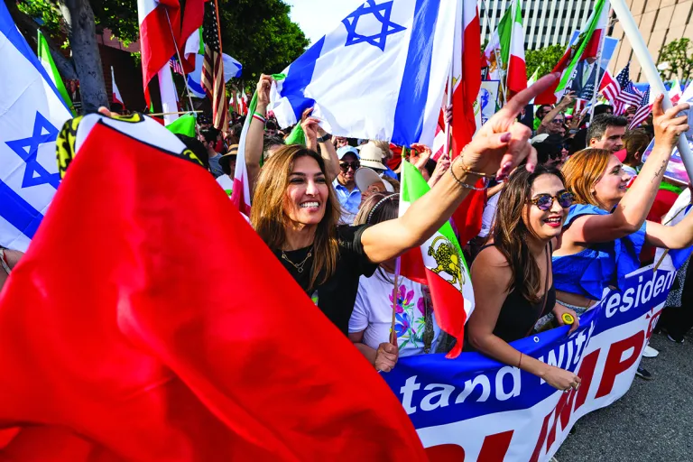 A large crowd of demonstrators gather near the Federal Building in the Westwood area to celebrate and call for freedom for the Iranian people in the wake of U.S.-Israel attacks on Iran that killed Iran's Supreme Leader Ayatollah Ali Khamenei on March 1, 2026 in Los Angeles, California. (Photo by Qian Weizhong/VCG via Getty Images)