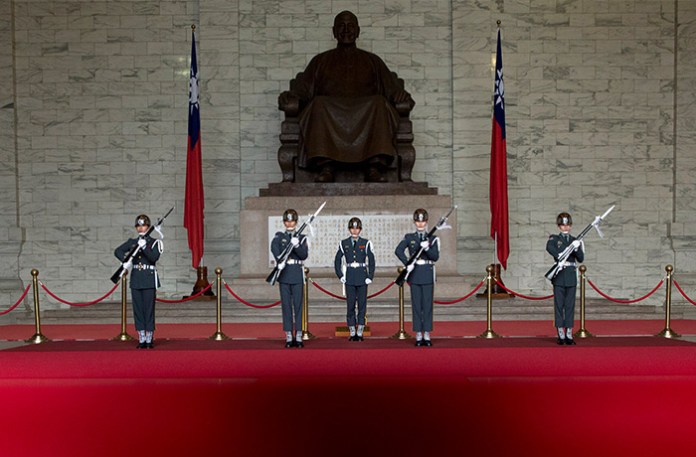 Members of the Taiwanese honor guard take part in a change of duty ceremony at the Chiang Kai-shek Memorial Hall in Taipei, Taiwan. (Ng Han Guan/AP)