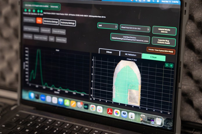 A screen shows what one of Gecko Robotics's robots are measuring.