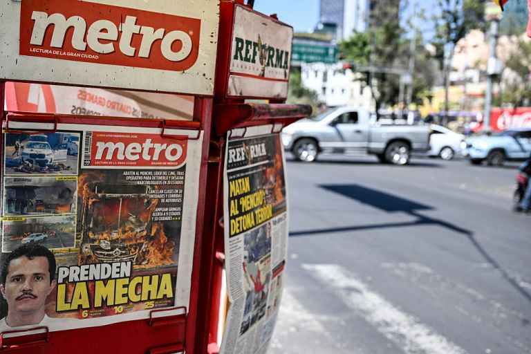 The front page of a local newspaper displays news about the death of Nemesio Oseguera, alias 