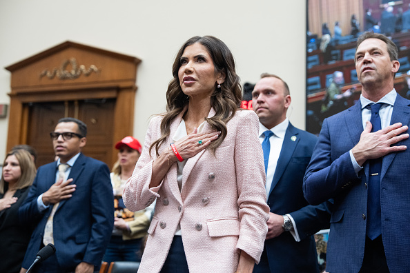 DHS Secretary Kristi Noem recites the Pledge of Allegiance before the House Judiciary Committee hearing titled 