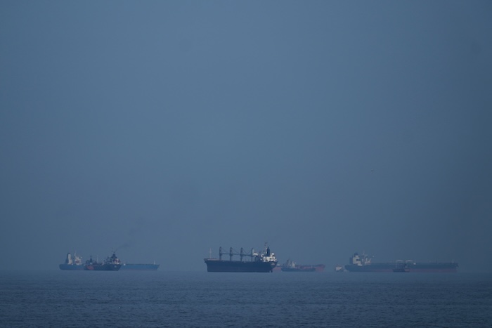 Oil tankers and cargo ships line up in the Strait of Hormuz.