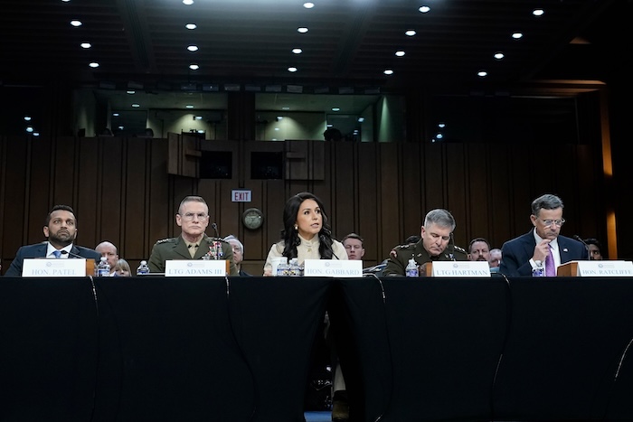Director of National Intelligence Tulsi Gabbard speaks as, from left, FBI Director Kash Patel, Defense Intelligence Agency Director James Adams III, Acting Commander of the U.S. Cyber Command William Hartman, and CIA Director John Ratcliffe listen during the Senate Committee on Intelligence hearings to examine worldwide threats on Capitol Hill Wednesday, March 18, 2026, in Washington. (AP Photo/Jose Luis Magana)