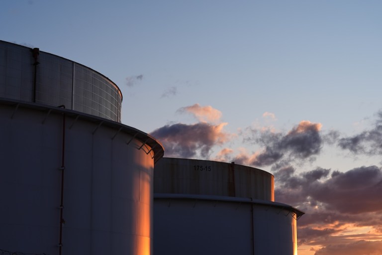Crude oil storage tanks are seen, Tuesday, March 17, 2026, in Baltimore.