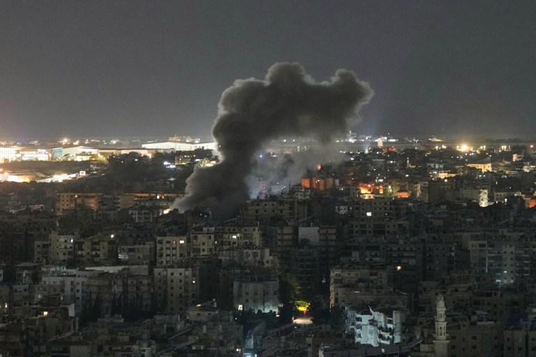 Smoke rises from a building following an Israeli airstrike in Lebanon.