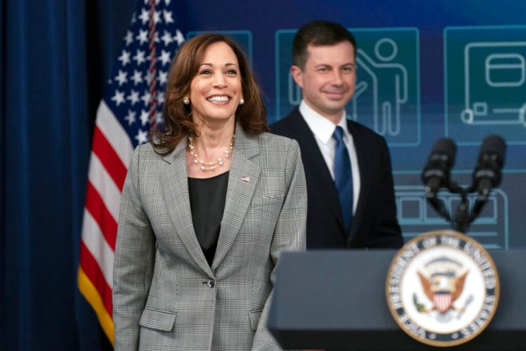Vice President Kamala Harris followed by Secretary of Transportation Pete Buttigieg, arrives at the Eisenhower Executive Office Building on the White House complex, in Washington, Monday, March 7, 2022. (AP Photo/Manuel Balce Ceneta)