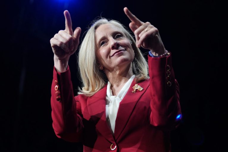Woman smiling and pointing