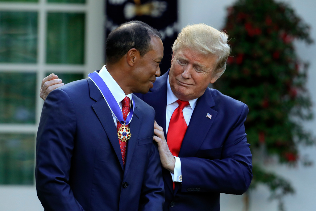 Police video shows Tiger Woods saying he called Trump after flipping car