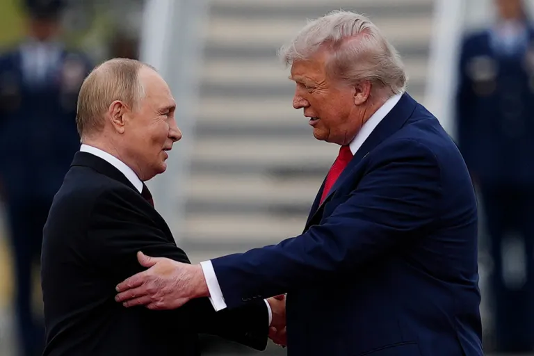 U.S. President Donald Trump greets Russian President Vladimir Putin.