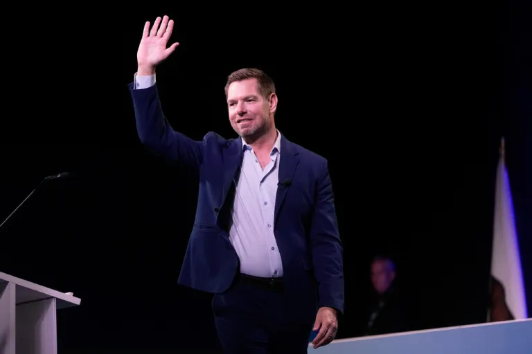 California gubernatorial candidate Eric Swalwell waves before speaking at the 2026 California Democratic Party State Convention