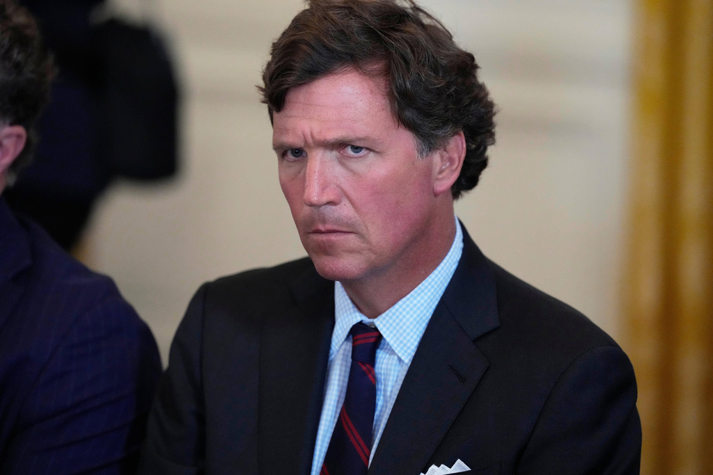 Trump touts higher favorability than Tucker Carlson as spat persists inside MAGA