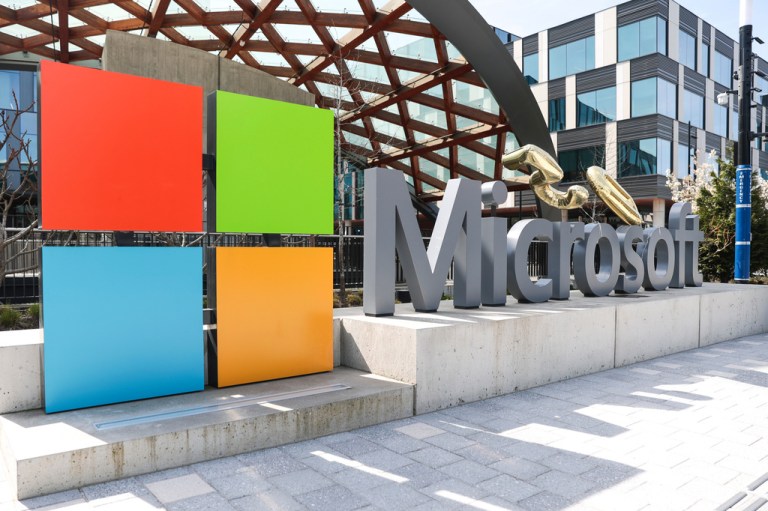A Microsoft sign and logo are displayed at the company's headquarters April 4, 2025.