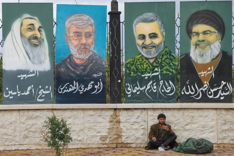 Posters glorifying deceased Iranian leaders as martyrs