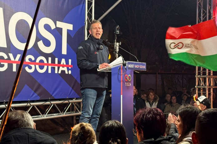 Peter Magyar speaks to supporters from the stage