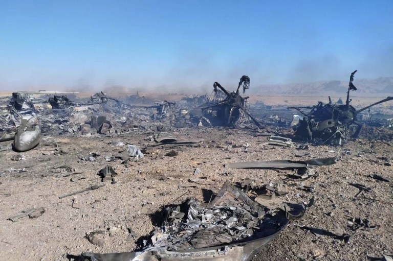 Wreckage is shown at what Iran's state TV claimed was the site of a downed American transport plane and two helicopters