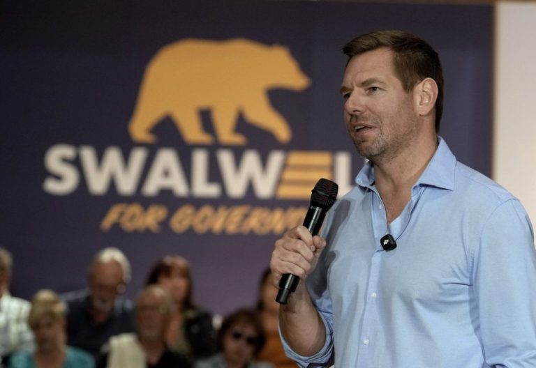 Rep. Eric Swalwell appears at an April 2026 town hall meeting in Sacramento.