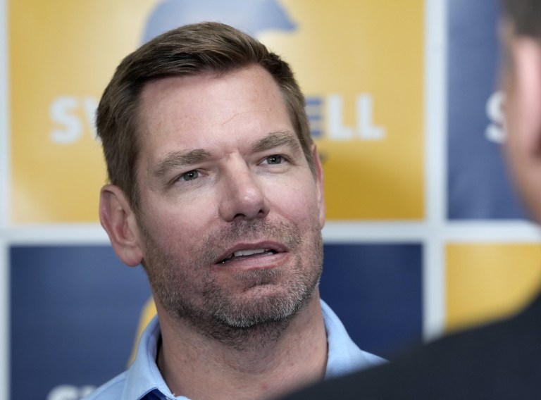 California gubernatorial candidate, Rep. Eric Swalwell, D-CA, talks with reporters after holding a town hall meeting in Sacramento, Calif., Tuesday, April 7, 2026.