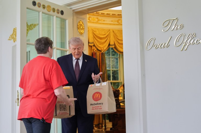 President Donald Trump speaks to a woman from DoorDash.