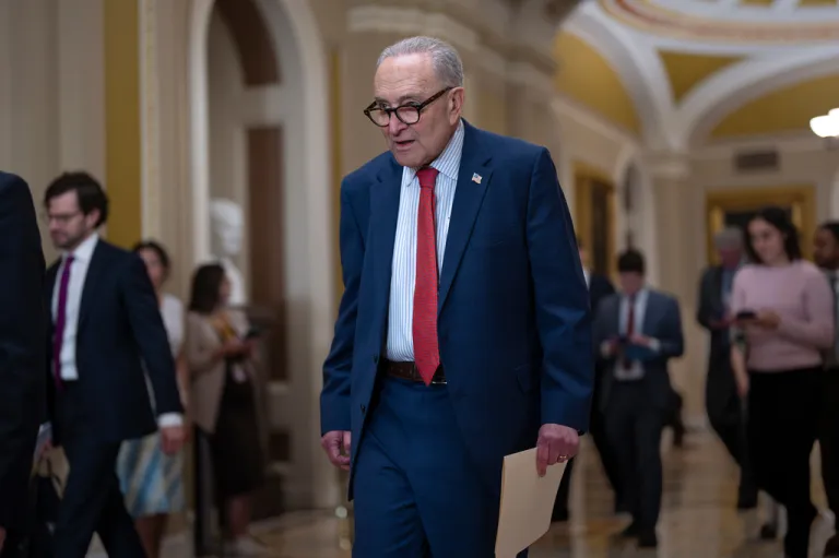 Senate Minority Leader Chuck Schumer, D-N.Y., walks at the Capitol in Washington, Tuesday, April 14, 2026.. (AP Photo/J. Scott Applewhite)