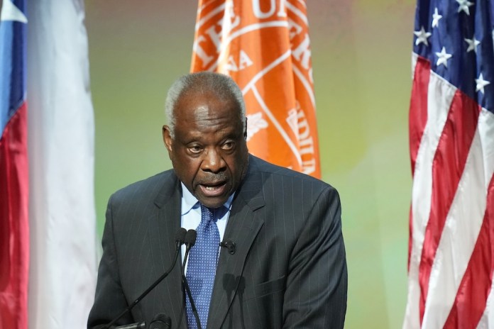 U.S. Supreme Court Associate Justice Clarence Thomas speaks at the University of Texas at Austin, in Austin, Texas, Wednesday, April 15, 2026. (AP Photo/Eric Gay)