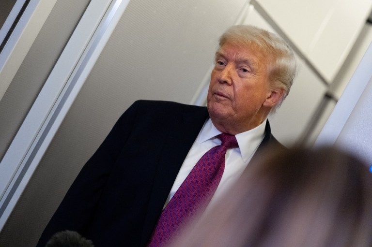 President Donald Trump speaks with reporters while in flight aboard Air Force One, Friday, April 17, 2026, while in route to Joint Base Andrews, Md.