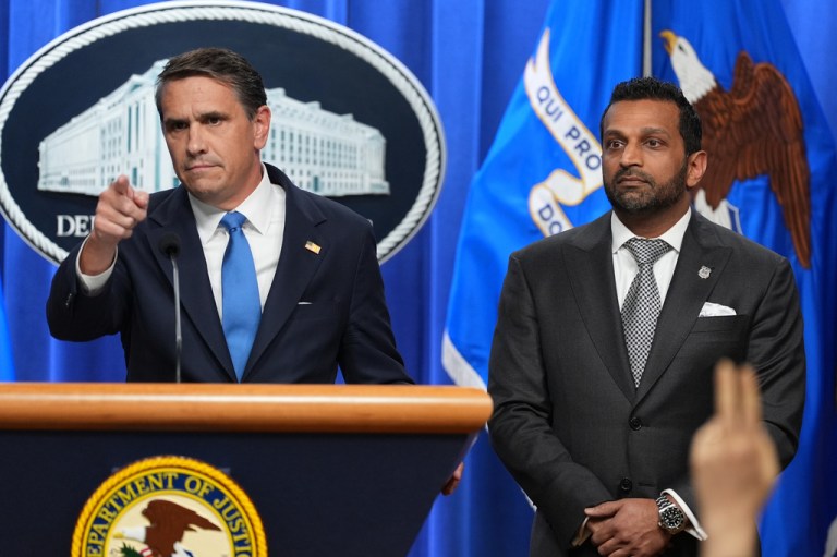 Acting Attorney General Todd Blanche speaks as FBI Director Kash Patel listens
