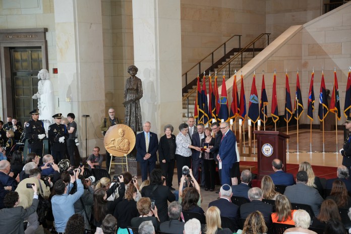 Members of Congress stand for a photo with the family of Congressional Gold Medal recipient Benjamin Ferencz's family at Days of Remembrance ceremony on Capitol Hill on April 14, 2026. (Washington Examiner/Sydney Topf)