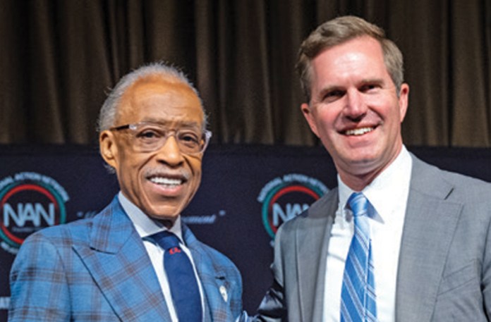 Gov. Andy Beshear (D-KY), at right, with the Rev. Al Sharpton in New York City, April 11, 2026.