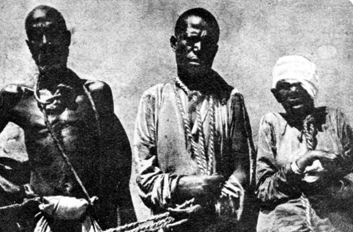 A trio of Arab-African slave traders captured by British authorities in 1892.  (Hulton Archive/Getty)