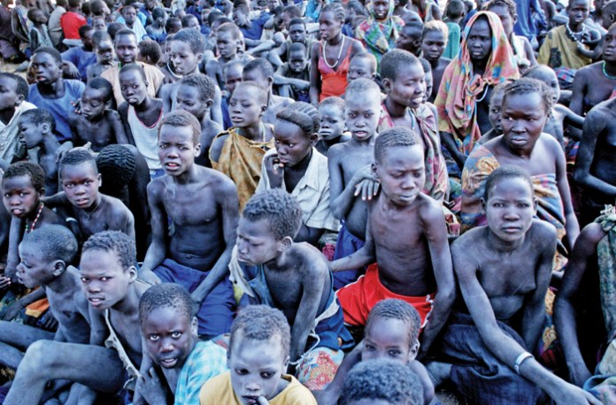 A group of enslaved Africans in Sudan whose freedom was purchased by the Swiss charity Christian Solidarity International in 2000. (Markus Matzel /Ullstein Bild/Getty)