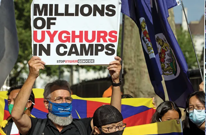 A London protest against mass detention and slave labor in China.